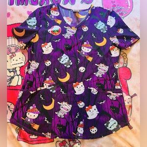 NWT* 2023 Halloween Hello Kitty Sanrio Scrub top with pockets, size small